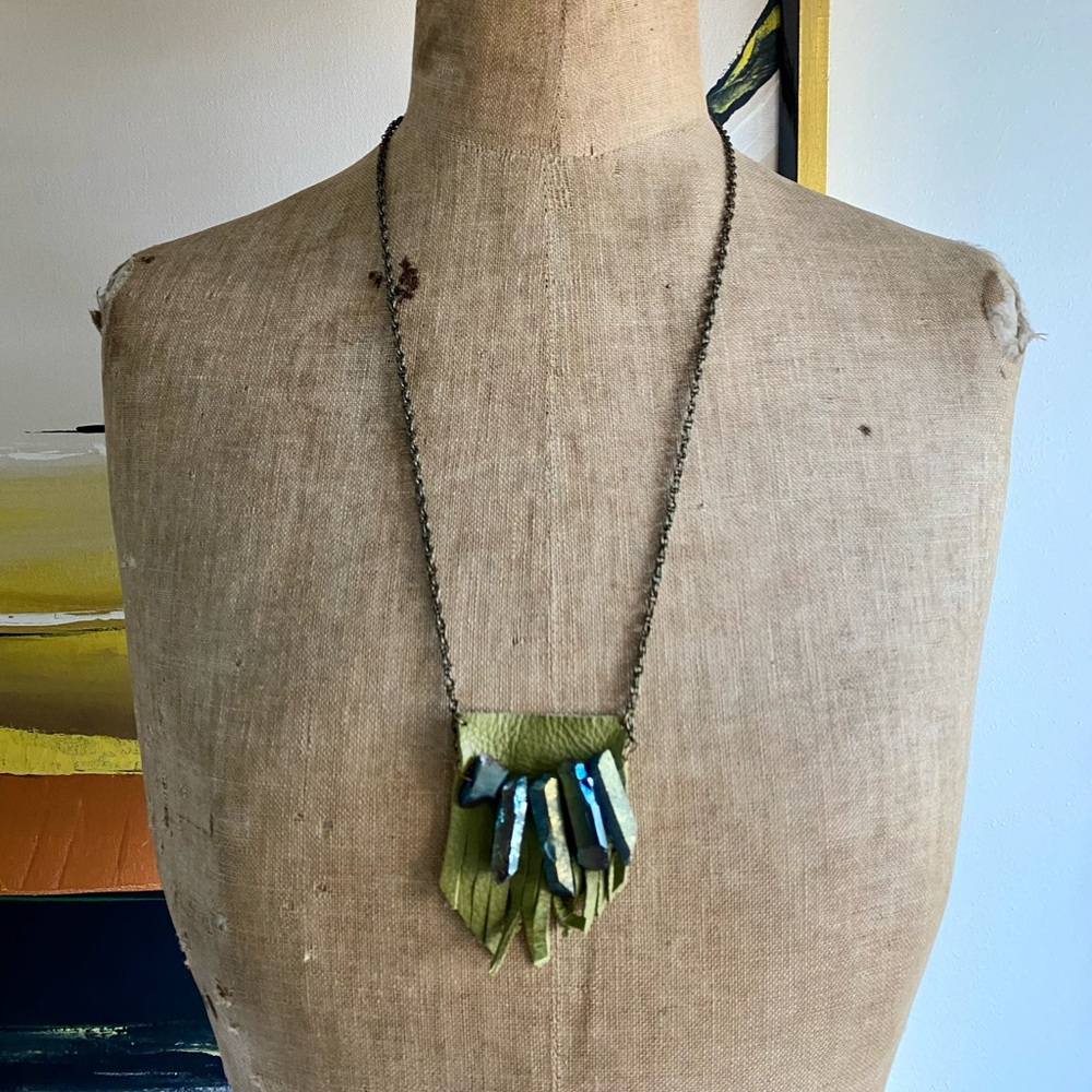 Fringed leather necklace with metallic pieces